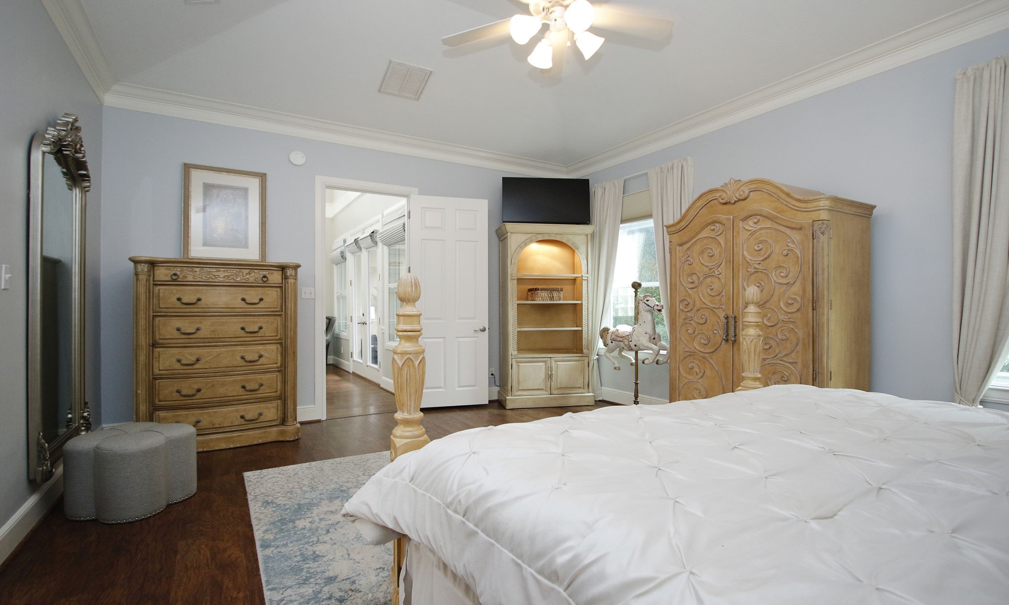 16610 Manningtree Lane Spring, TX 77379 - Photo 17 of 50 The primary bedroom is located in the back of the home off the family room.