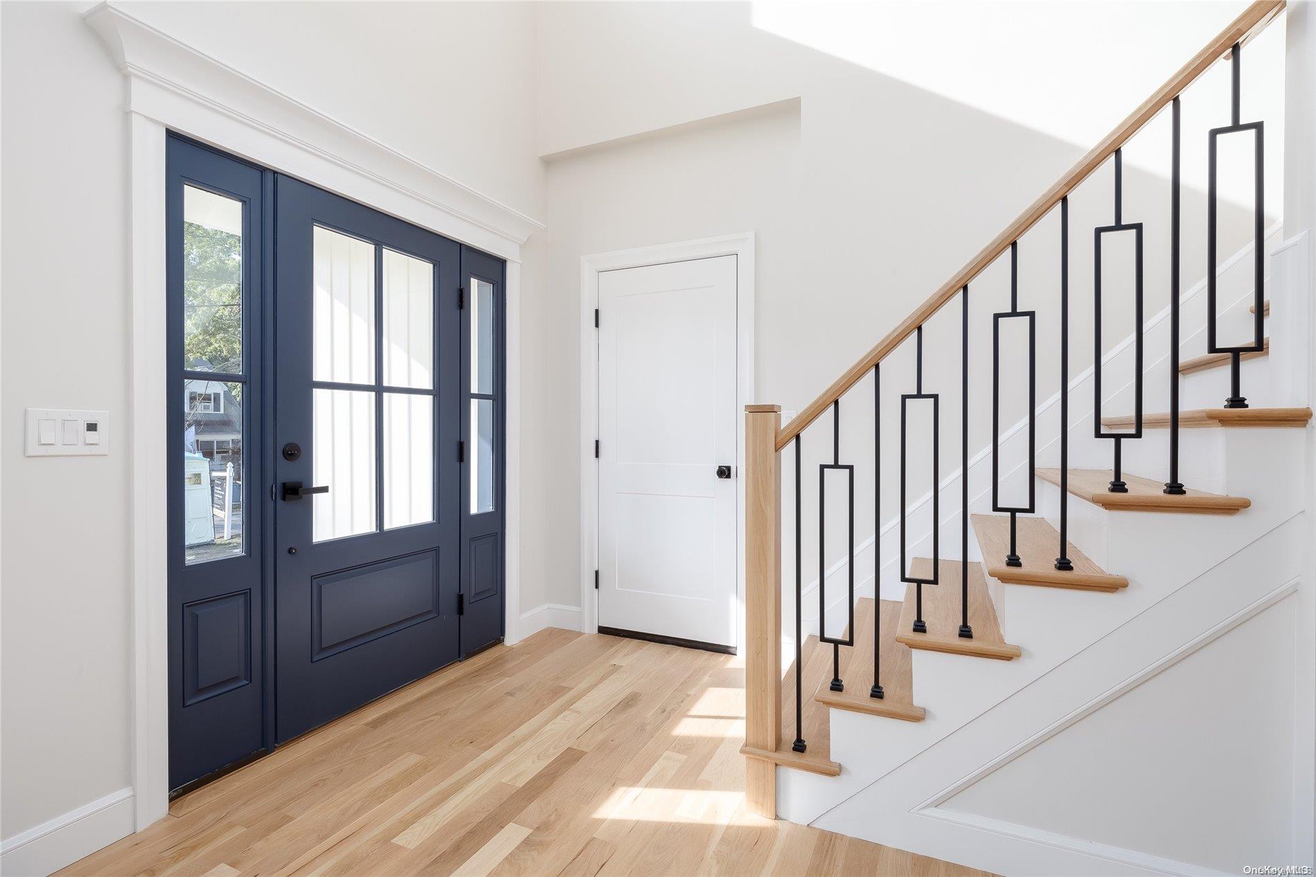 a view of an entryway with staircase