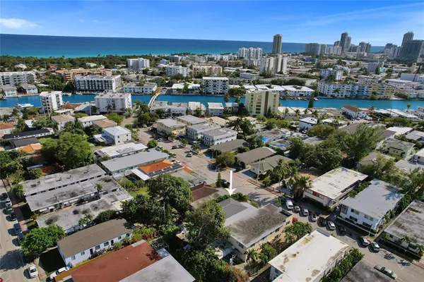 an aerial view of a city with lots of residential buildings