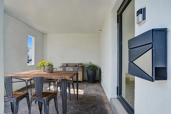 a view of a dining room with furniture