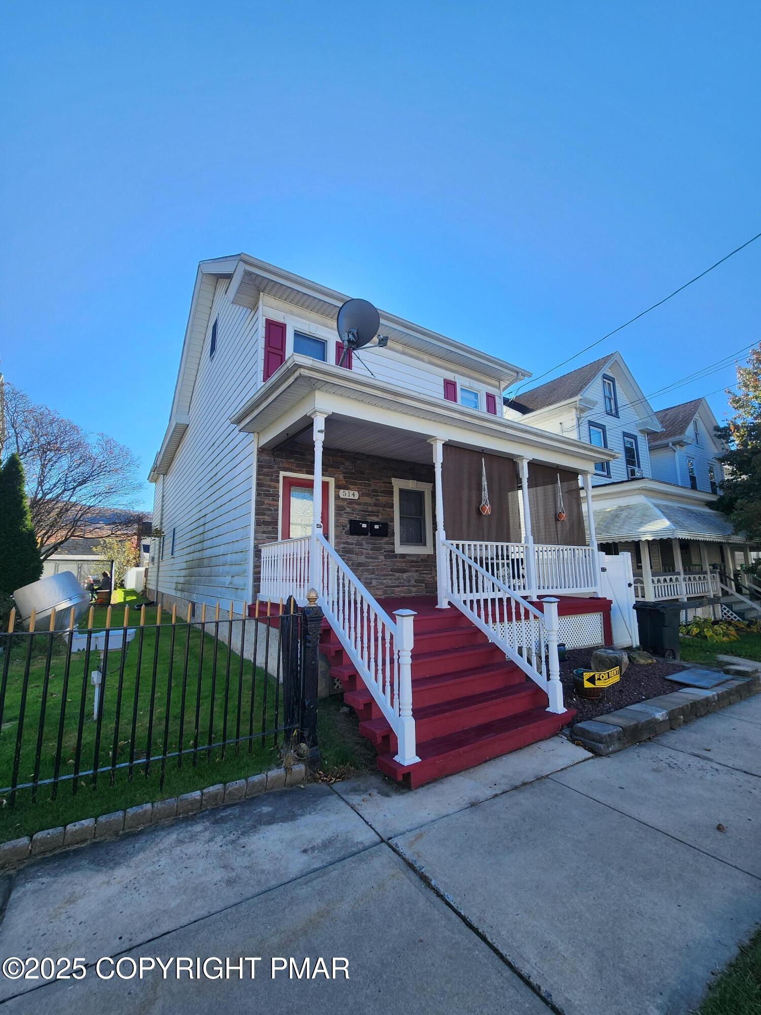 514 North Street, Unit 2 Jim Thorpe, PA 18229 - Photo 2 of 22 a front view of a house with a yard