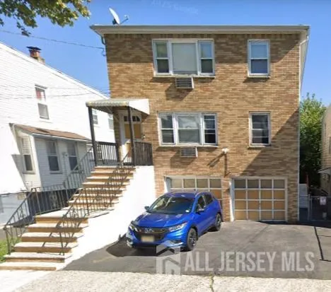 a front view of a house with glass windows