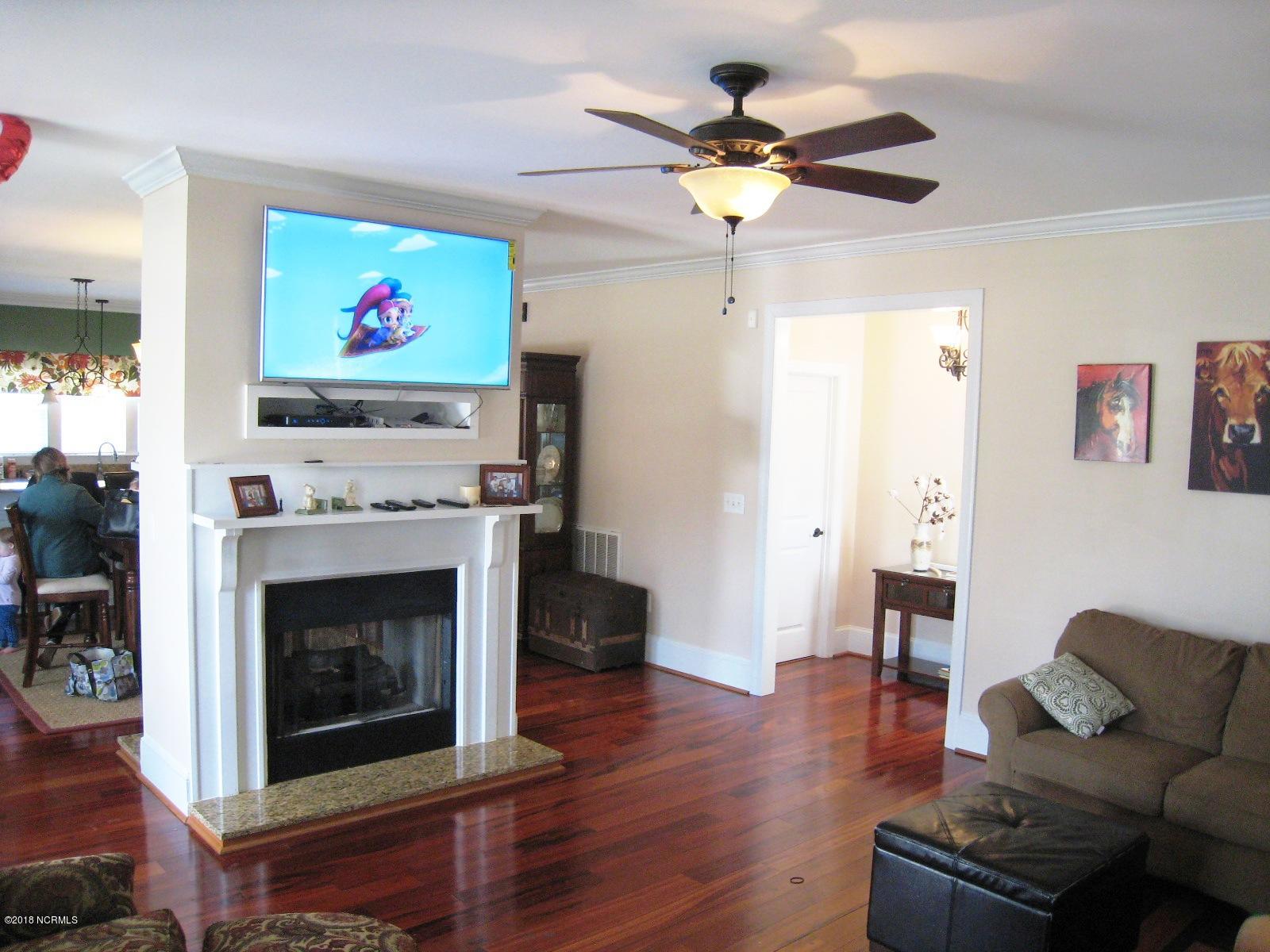 247 Lyman Road Beulaville, NC 28518 - Photo 6 of 35 Upgraded trim & fireplace island