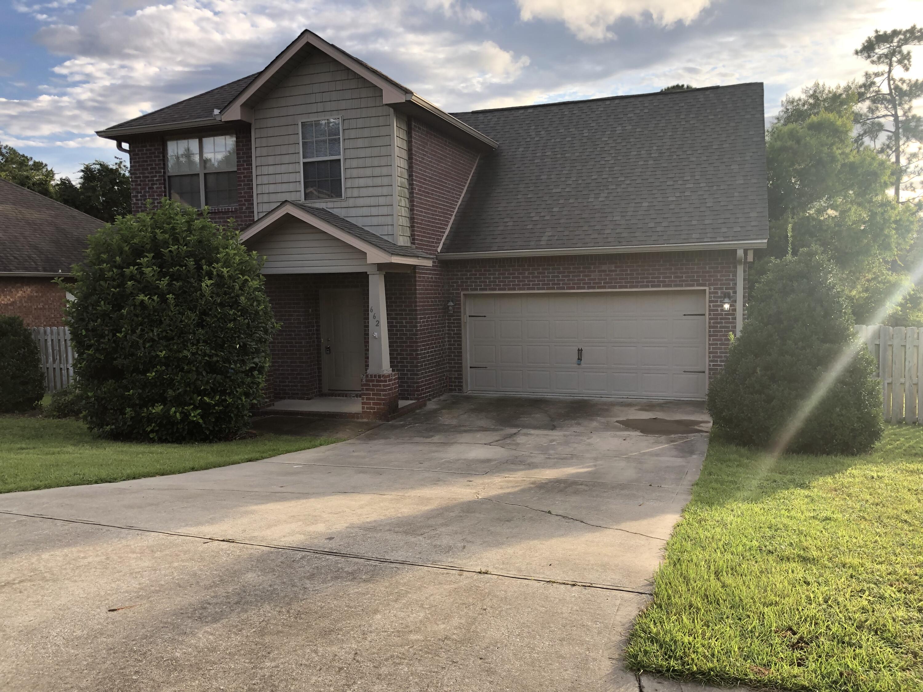 662 Red Fern Road Crestview, FL 32536 - Photo 1 of 9 front view of a house with a yard