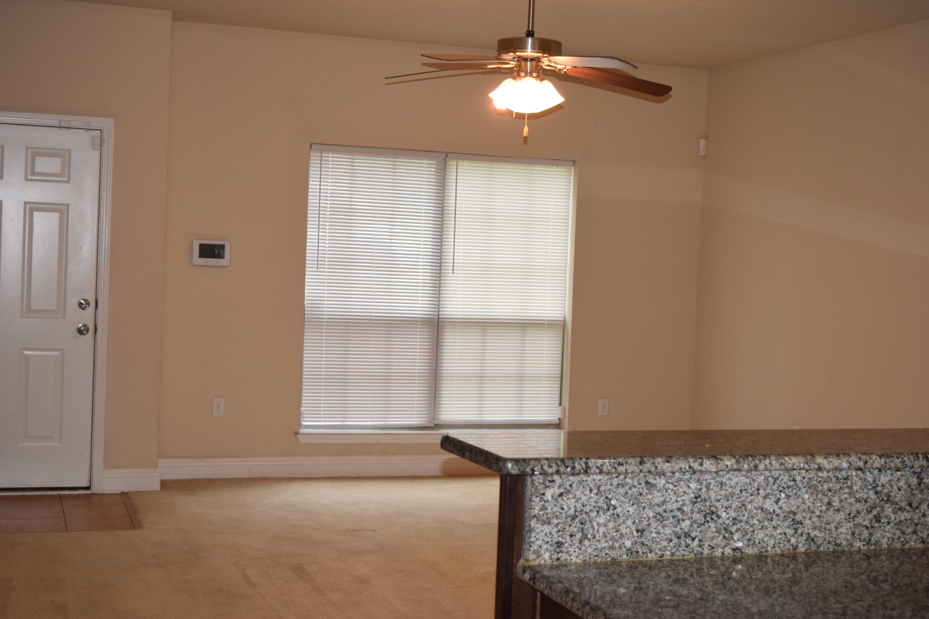 662 Red Fern Road Crestview, FL 32536 - Photo 4 of 9 a view of an empty room with a window