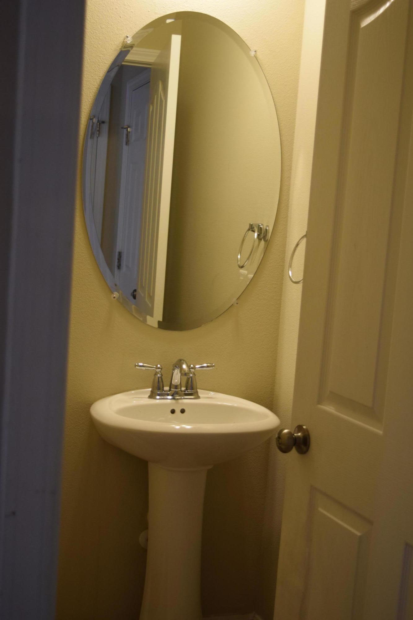 662 Red Fern Road Crestview, FL 32536 - Photo 8 of 9 a bathroom with a sink and a mirror