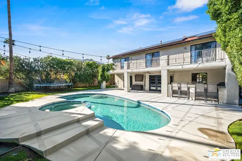 a view of a house with a swimming pool