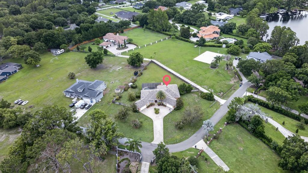 9427 Eddings Road Odessa, FL 33556 - Photo 91 of 93 an aerial view of a residential houses with outdoor space and street view