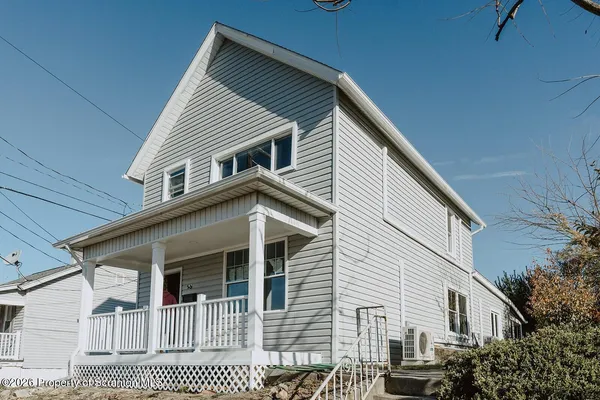 a view of a house with a balcony