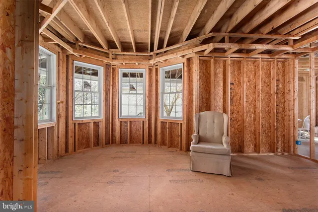 a view of a bathtub in a hallway