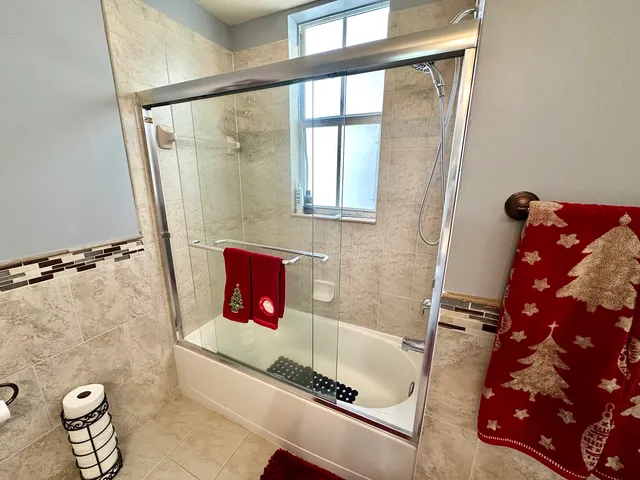 a bathroom with a sink and a shower