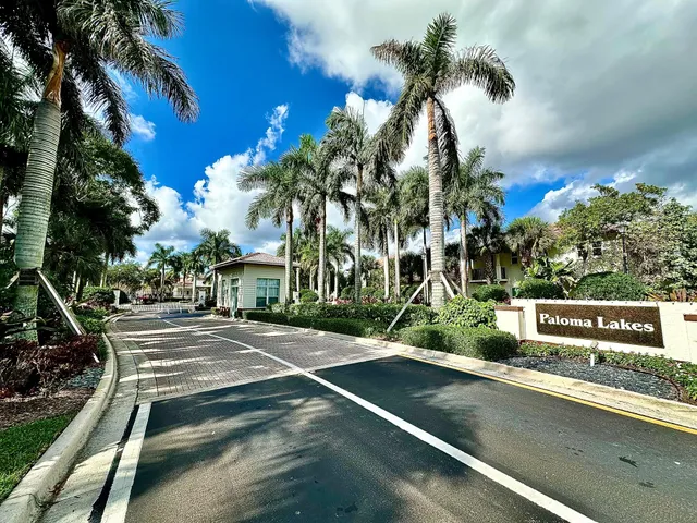 a view of a patio with a yard