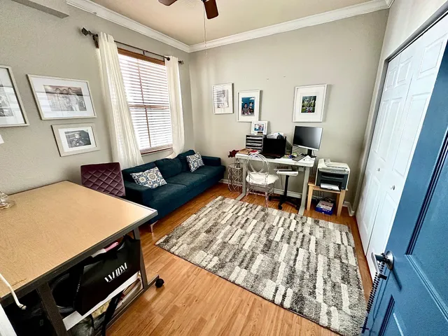 a living room with furniture and a window