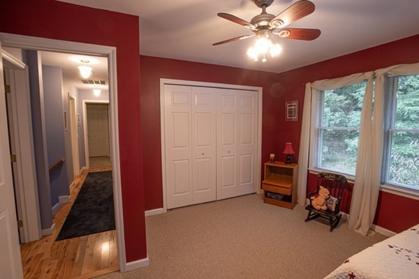 888 Florence Road Northampton, MA 01062 - Photo 26 of 37 a view of a livingroom with a ceiling fan and a window