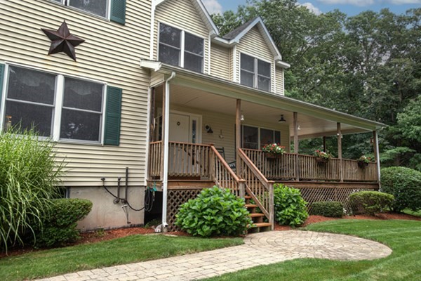 888 Florence Road Northampton, MA 01062 - Photo 3 of 37 a front view of a house with a yard