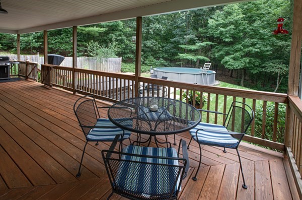 888 Florence Road Northampton, MA 01062 - Photo 5 of 37 a view of a chairs on wooden deck