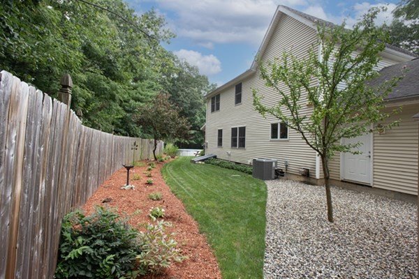 888 Florence Road Northampton, MA 01062 - Photo 10 of 37 a front view of a house with garden