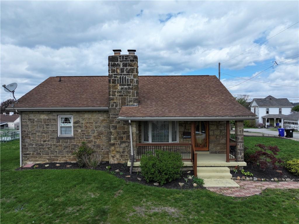 699 Kaye Avenue Monaca, PA 15061 - Photo 4 of 43 a front view of a house with garden