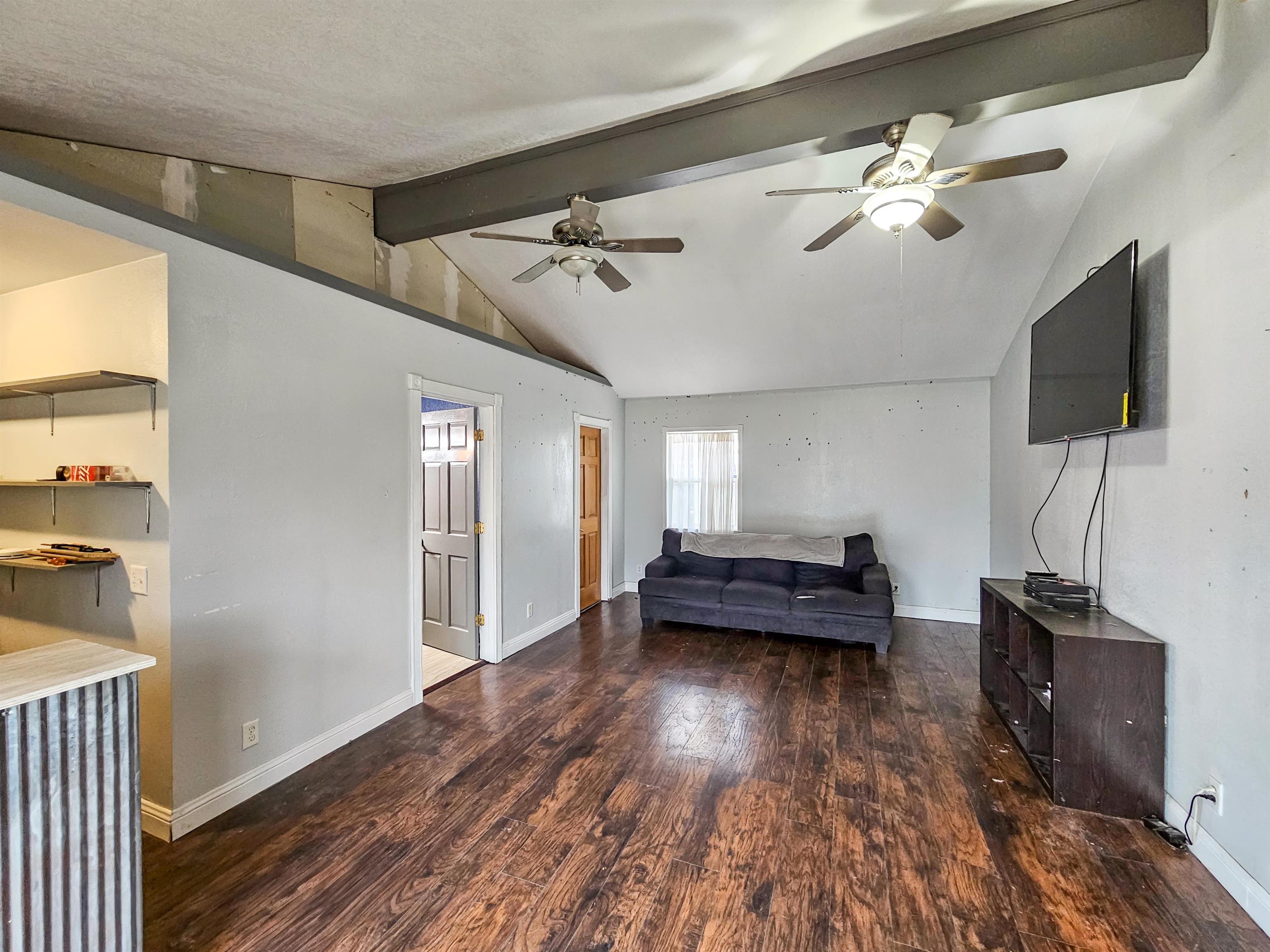 10582 Atwood Road Roscoe, IL 61073 - Photo 16 of 27 a living room with furniture and a flat screen tv
