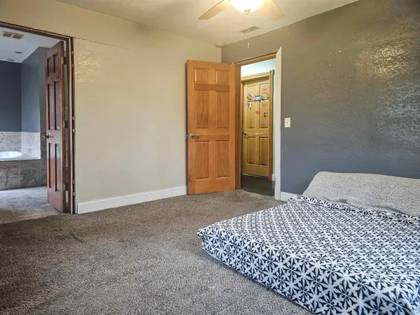a aerial view of a house with a yard