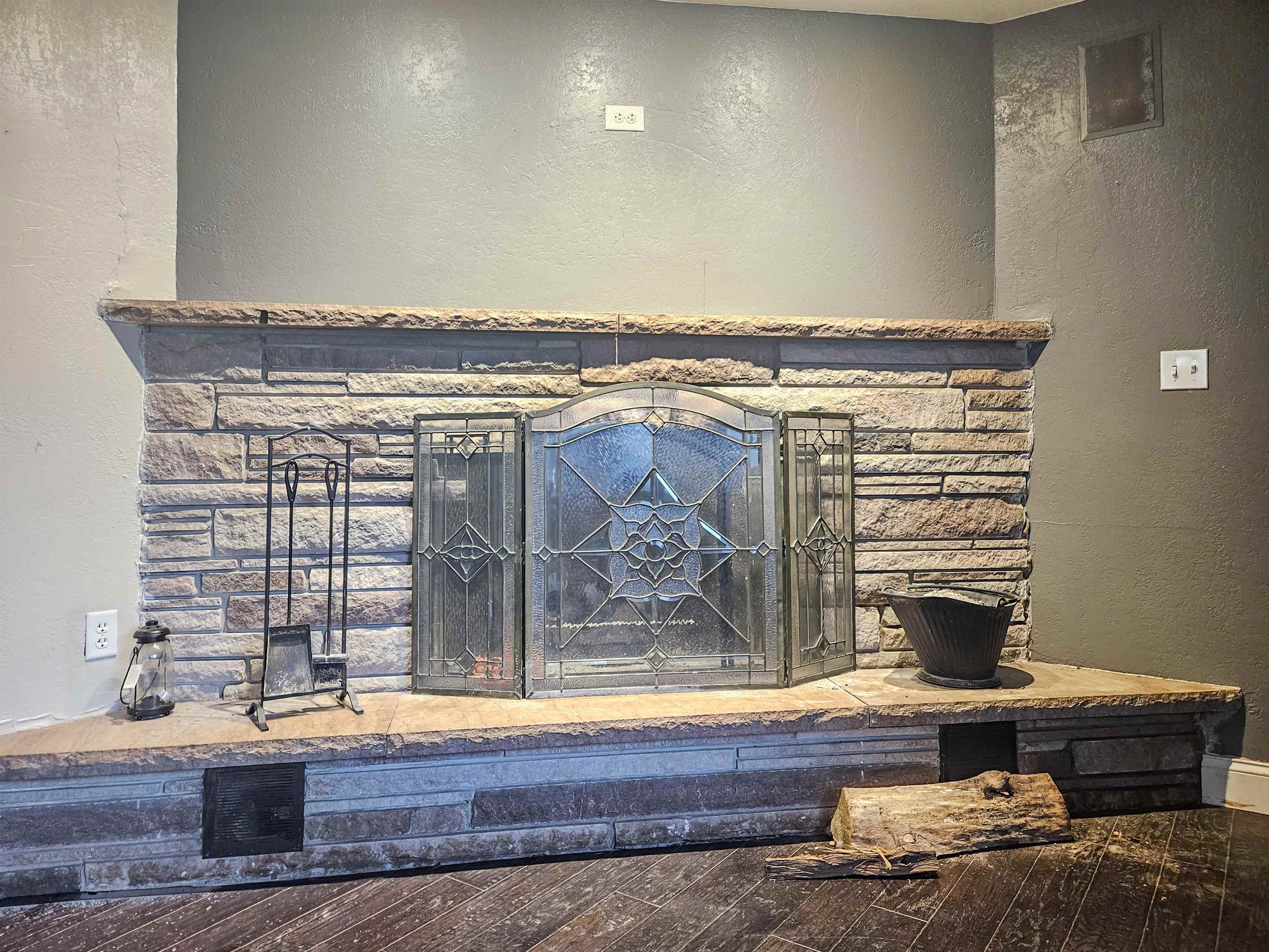 10582 Atwood Road Roscoe, IL 61073 - Photo 6 of 27 a room with fireplace and furniture