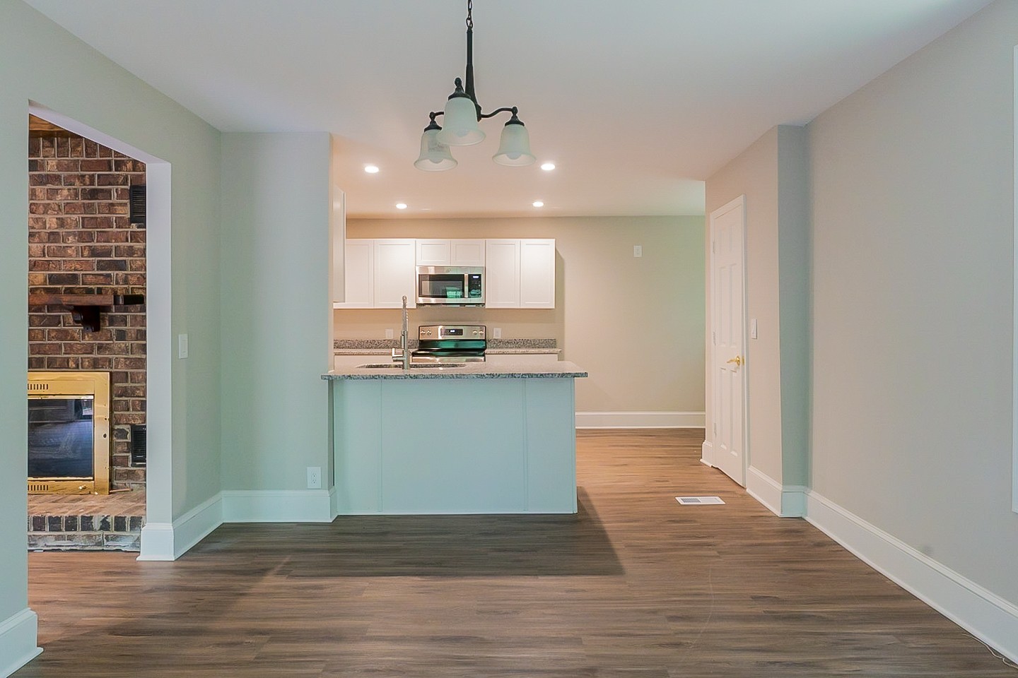 4839 Kinneys School Road Springfield, TN 37172 - Photo 4 of 35 a view of a kitchen with a sink and wooden floor