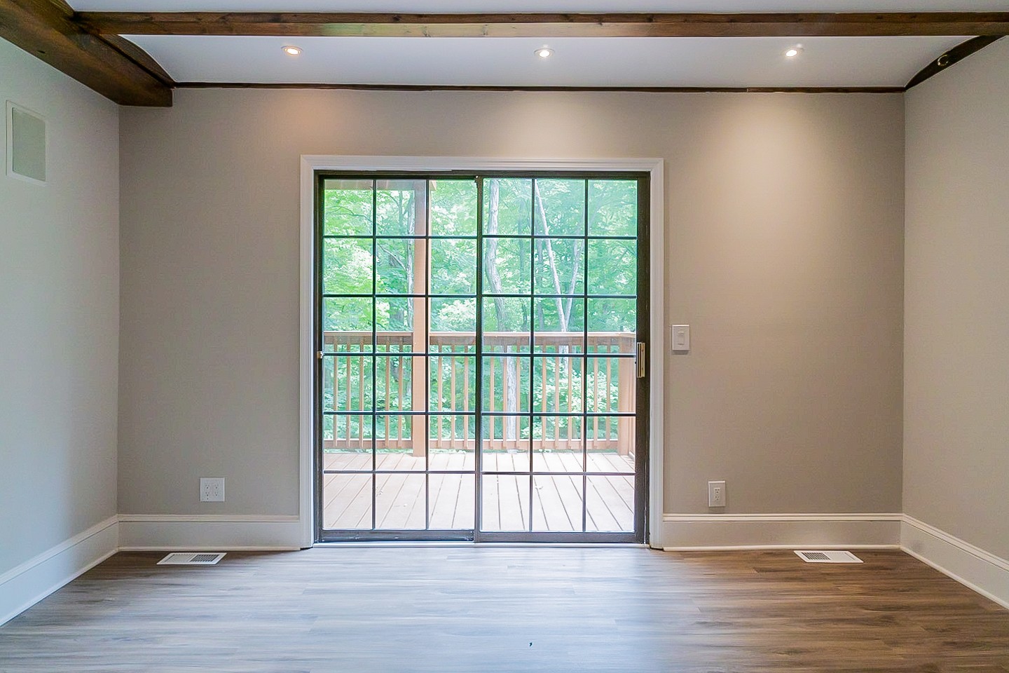 4839 Kinneys School Road Springfield, TN 37172 - Photo 10 of 35 a view of an empty room with wooden floor and a window