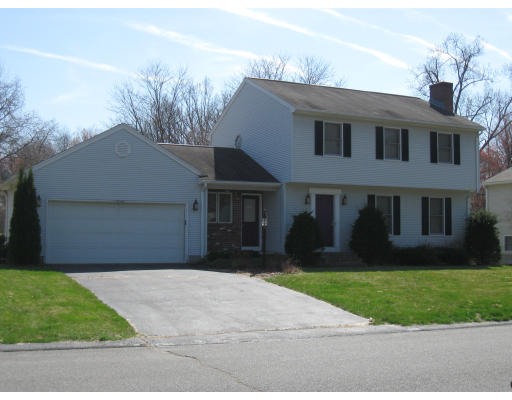 37 Vann Street Springfield, MA 01119 - Photo 1 of 1 a front view of house with yard and green space
