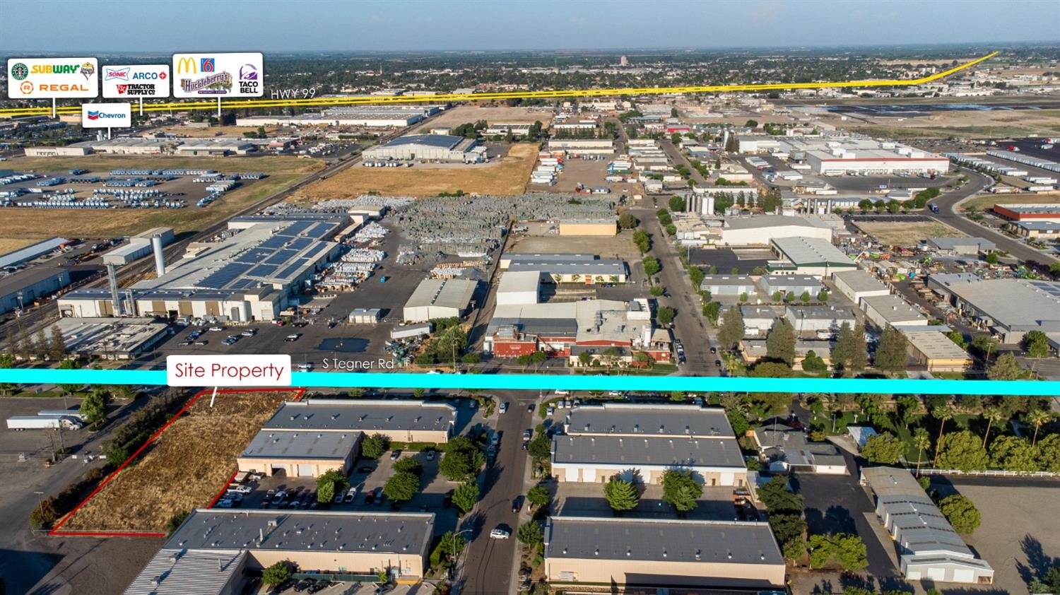 607 South Tegner Road Turlock, CA 95380 - Photo 3 of 5 an aerial view of a building with garden