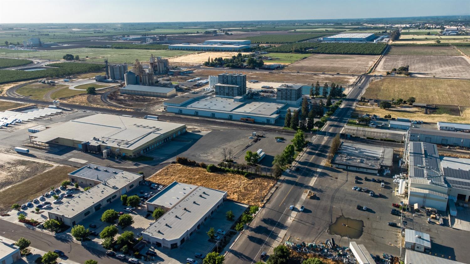 607 South Tegner Road Turlock, CA 95380 - Photo 4 of 5 an aerial view of a house with outdoor space