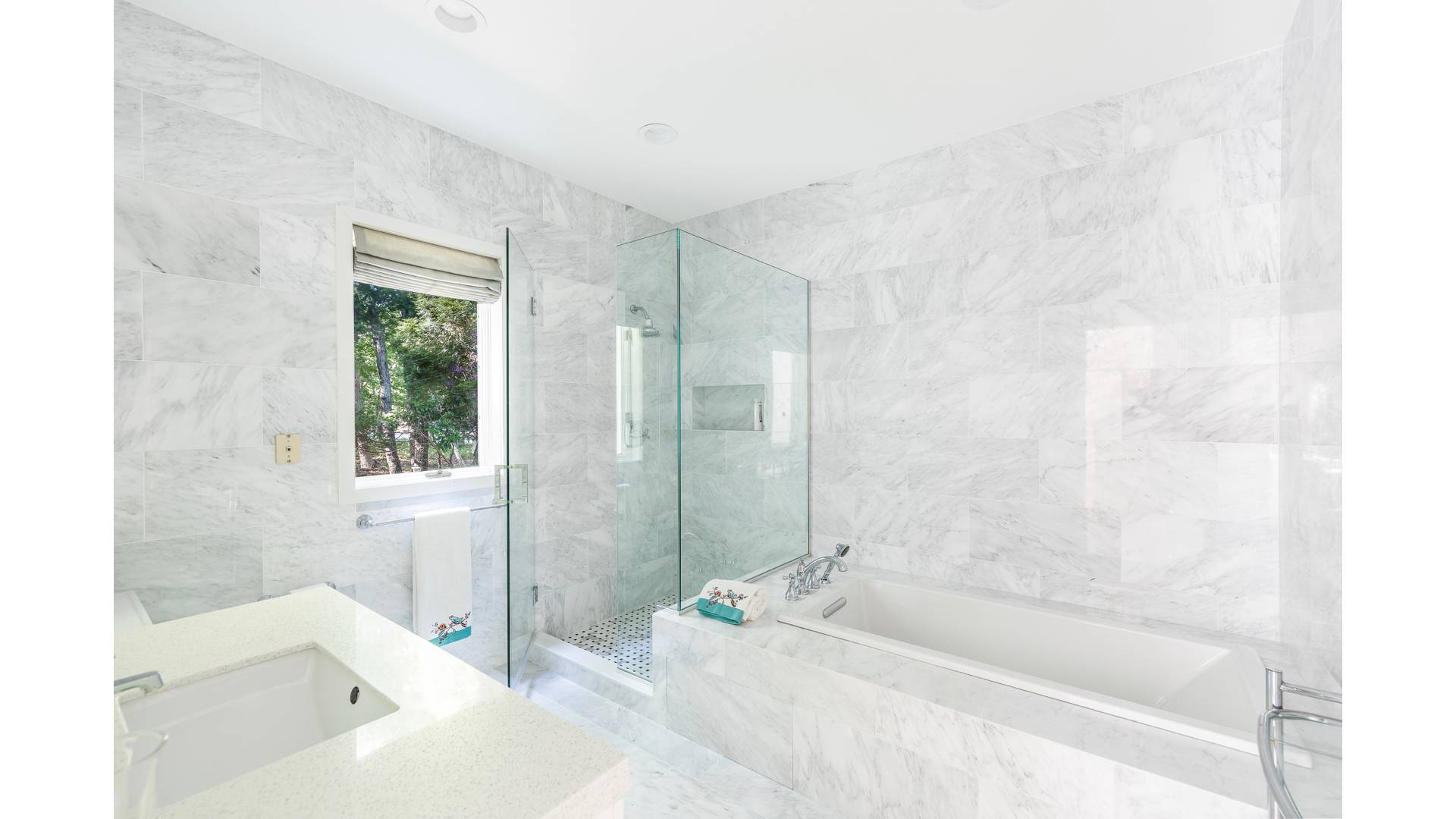 50 Tanager Lane Water Mill, NY 11976 - Photo 18 of 29 a bathroom with a bathtub and shower