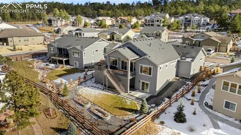 an aerial view of a residential apartment building with a yard