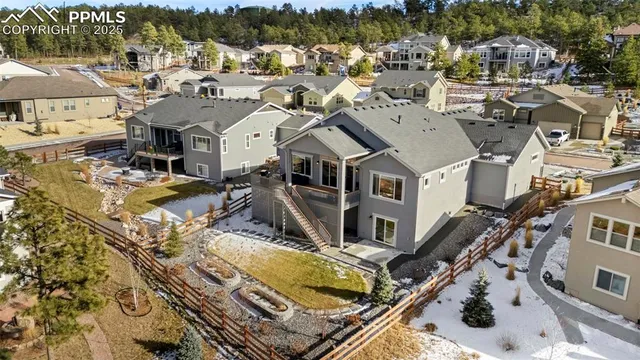 an aerial view of a residential apartment building with a yard