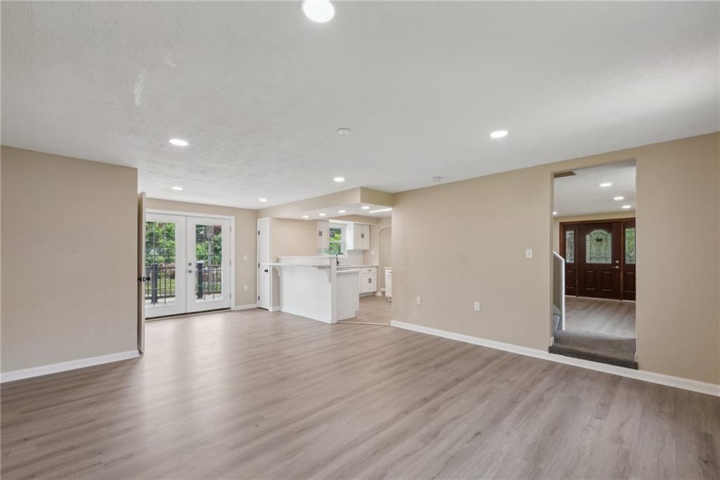 428 Beulah Road Pittsburgh, PA 15235 - Photo 16 of 39 a view of a kitchen with wooden floor and a window