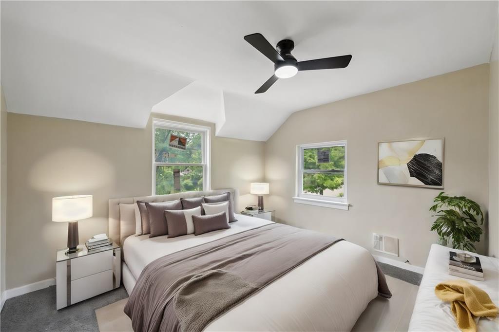 428 Beulah Road Pittsburgh, PA 15235 - Photo 25 of 39 a bedroom with a bed and window