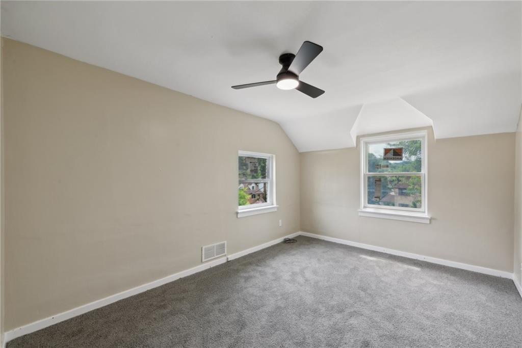 428 Beulah Road Pittsburgh, PA 15235 - Photo 26 of 39 a view of empty room with windows