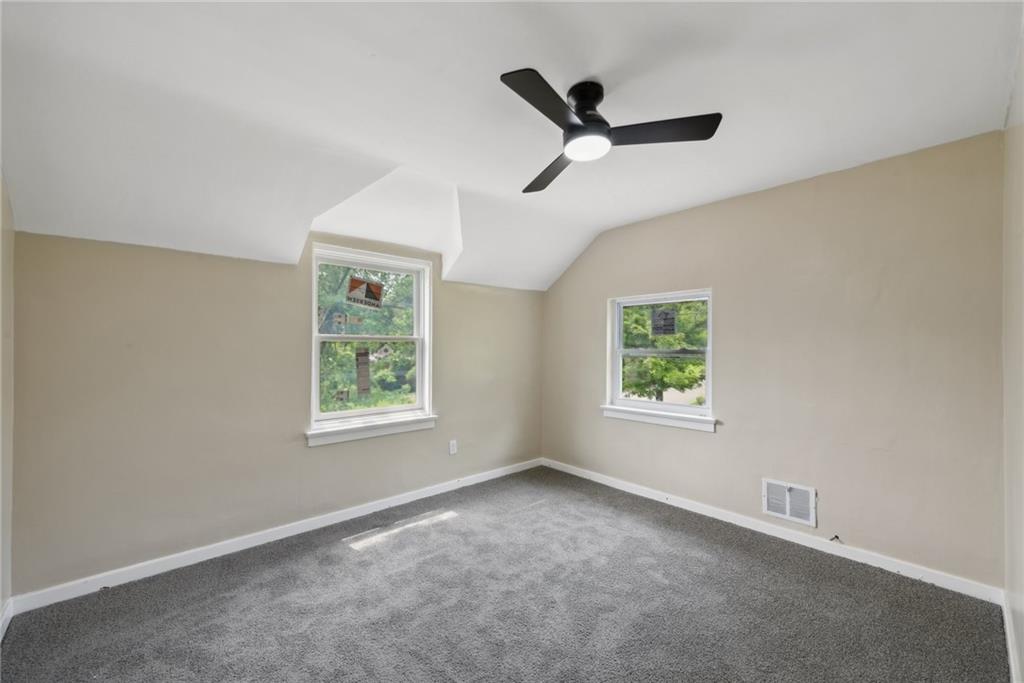 428 Beulah Road Pittsburgh, PA 15235 - Photo 29 of 39 a view of an empty room with a window