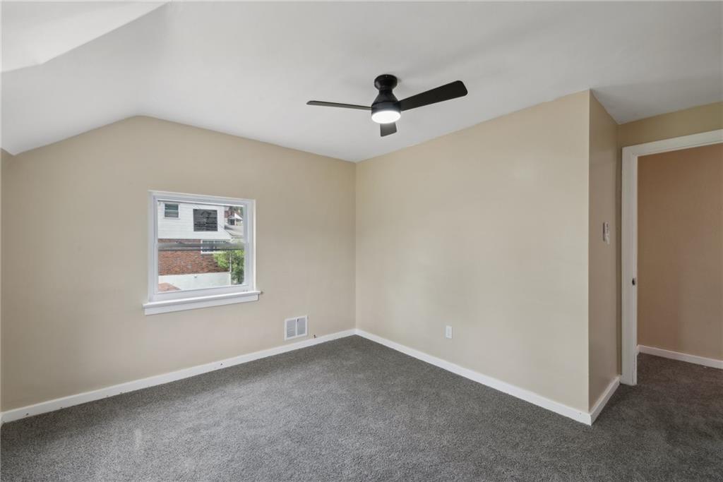 428 Beulah Road Pittsburgh, PA 15235 - Photo 30 of 39 a view of an empty room with a window
