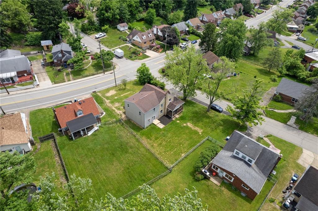 428 Beulah Road Pittsburgh, PA 15235 - Photo 38 of 39 an aerial view of a house with a garden and swimming pool
