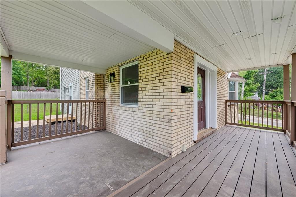 428 Beulah Road Pittsburgh, PA 15235 - Photo 4 of 39 a view of a house with wooden deck