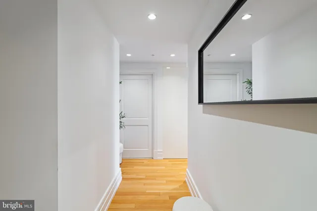 a bathroom with a toilet sink and tub