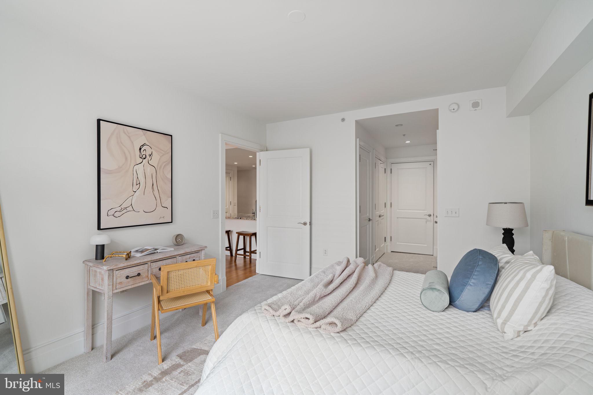 130 South 18th Street, Unit 501 Philadelphia, PA 19103 - Photo 23 of 43 a bedroom with a bed and the view of bathroom