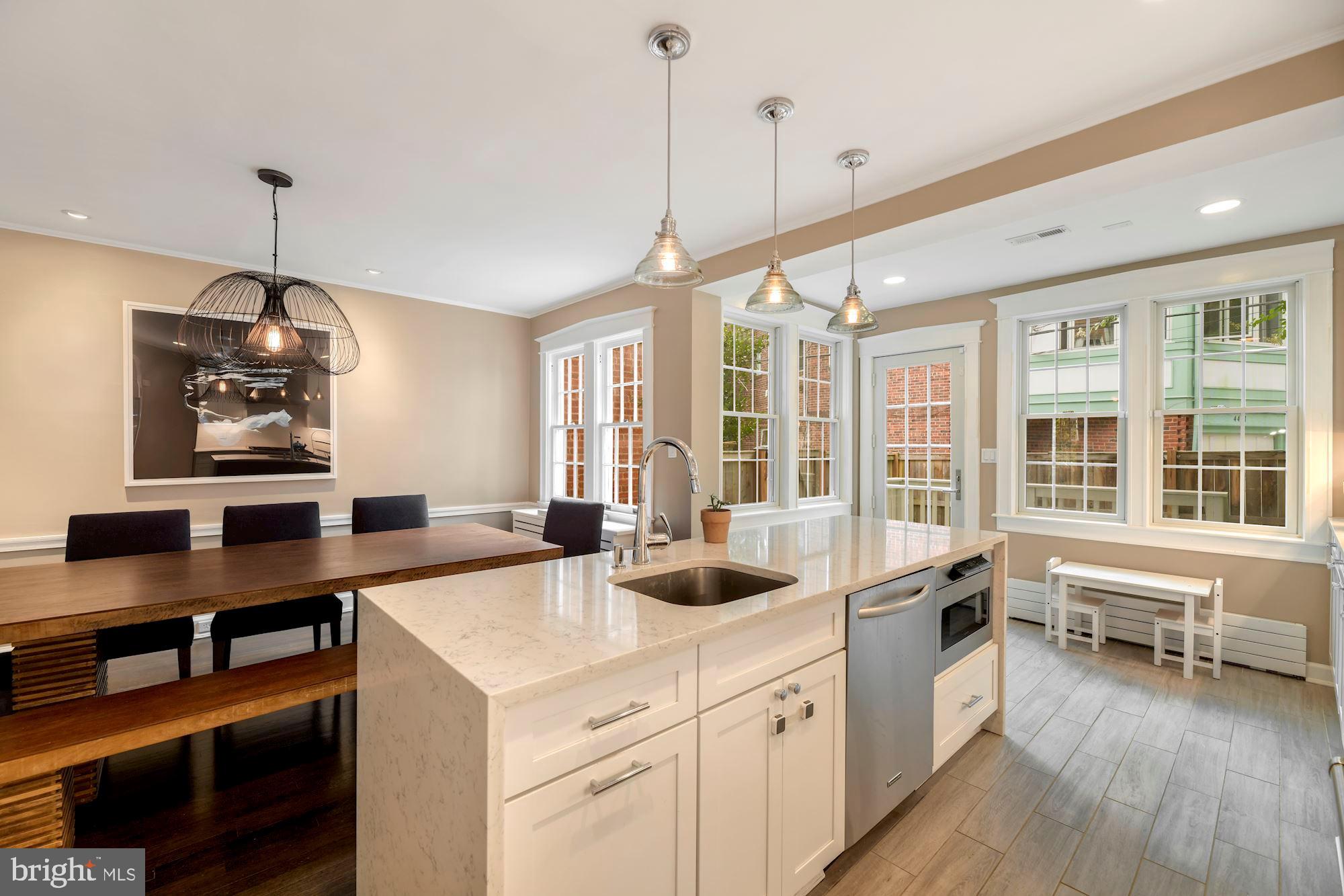 1540 44th Street Northwest Washington, DC 20007 - Photo 12 of 39 Large, open kitchen/dining/sunroom.