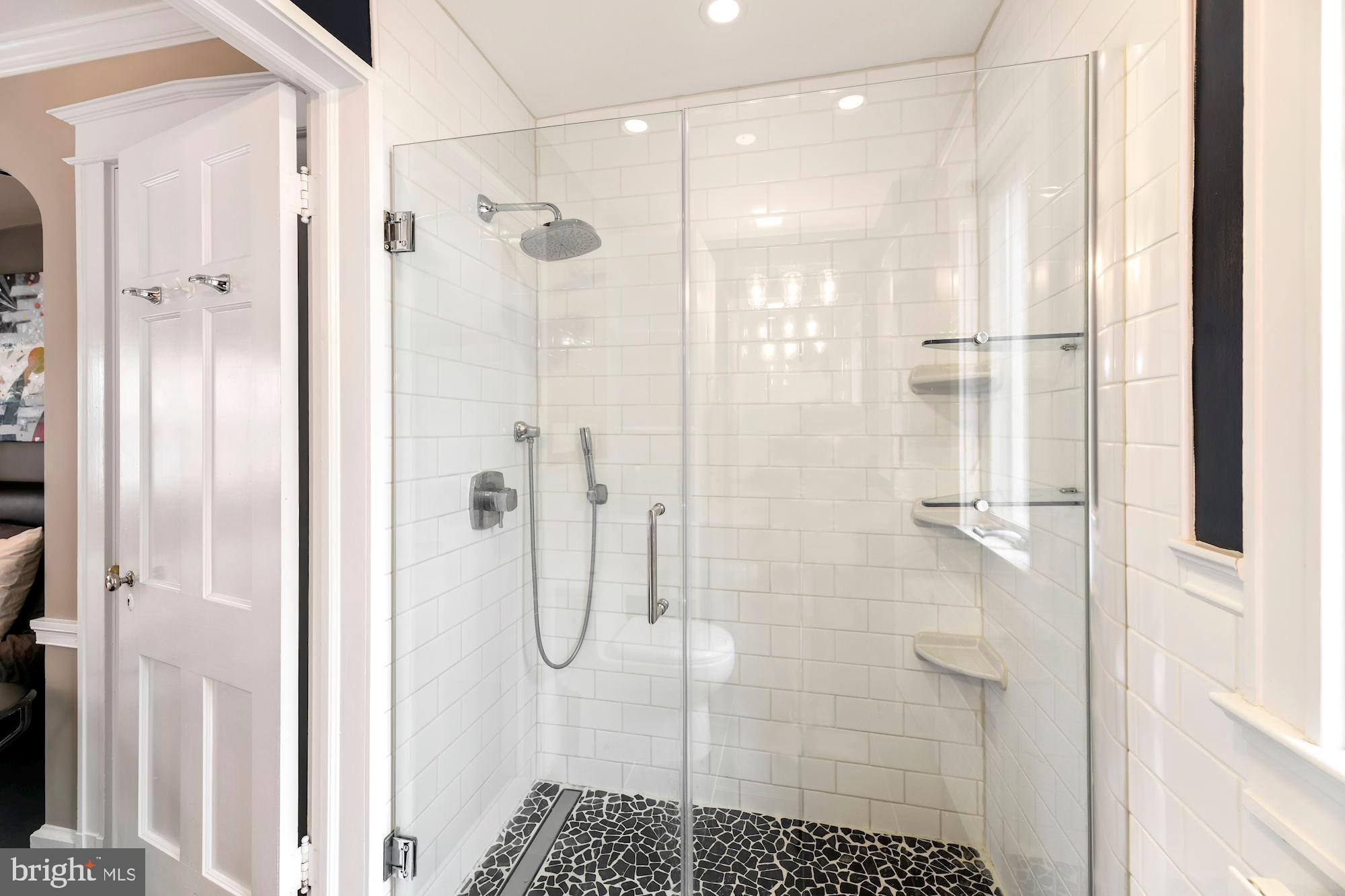 1540 44th Street Northwest Washington, DC 20007 - Photo 21 of 39 Glass shower and rain shower in en suite.
