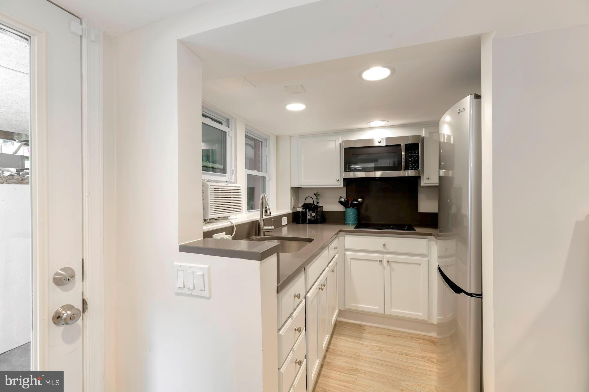 1540 44th Street Northwest Washington, DC 20007 - Photo 30 of 39 Lower level full kitchen.