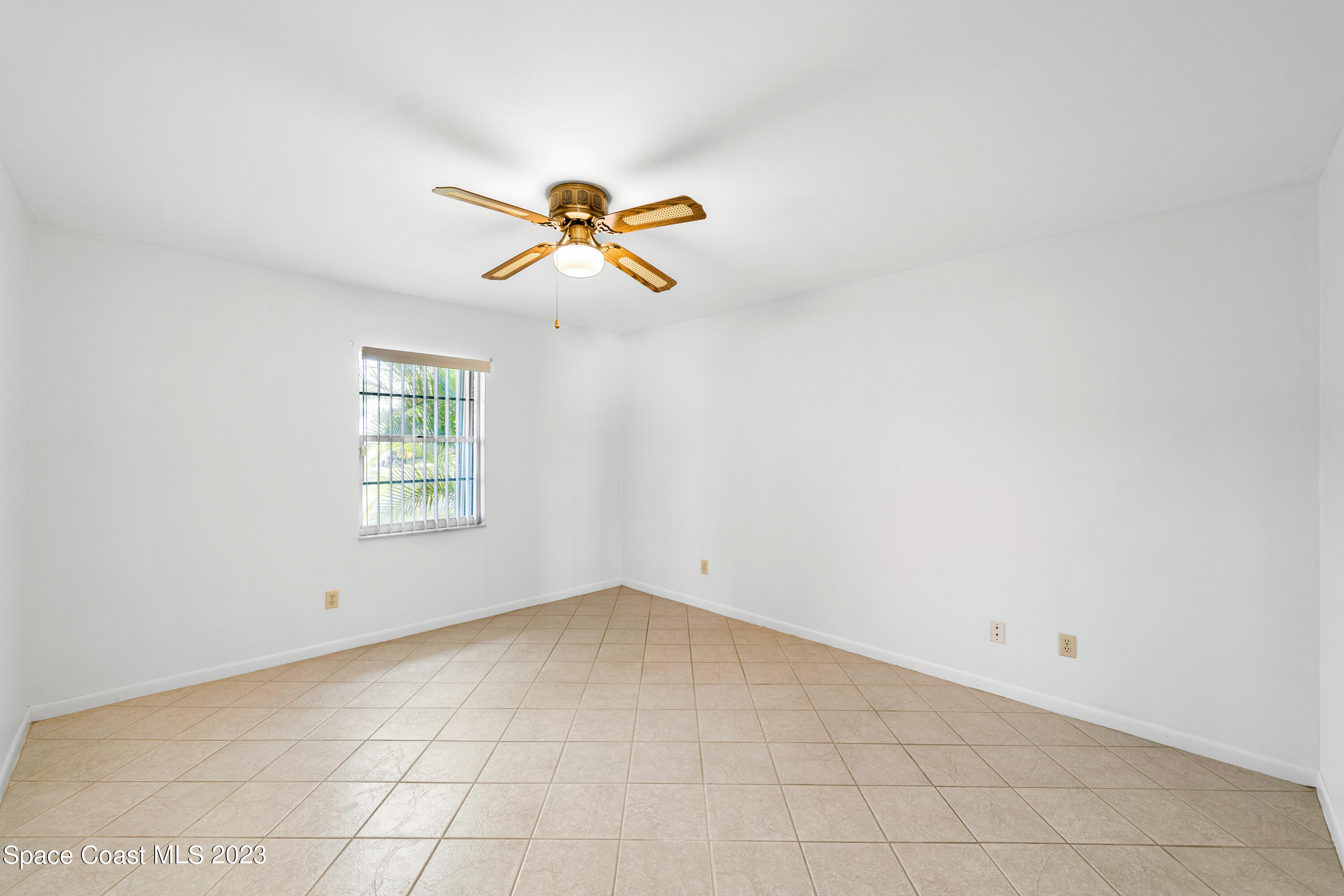 7746 Mango Grove Avenue Melbourne, FL 32904 - Photo 10 of 21 an empty room