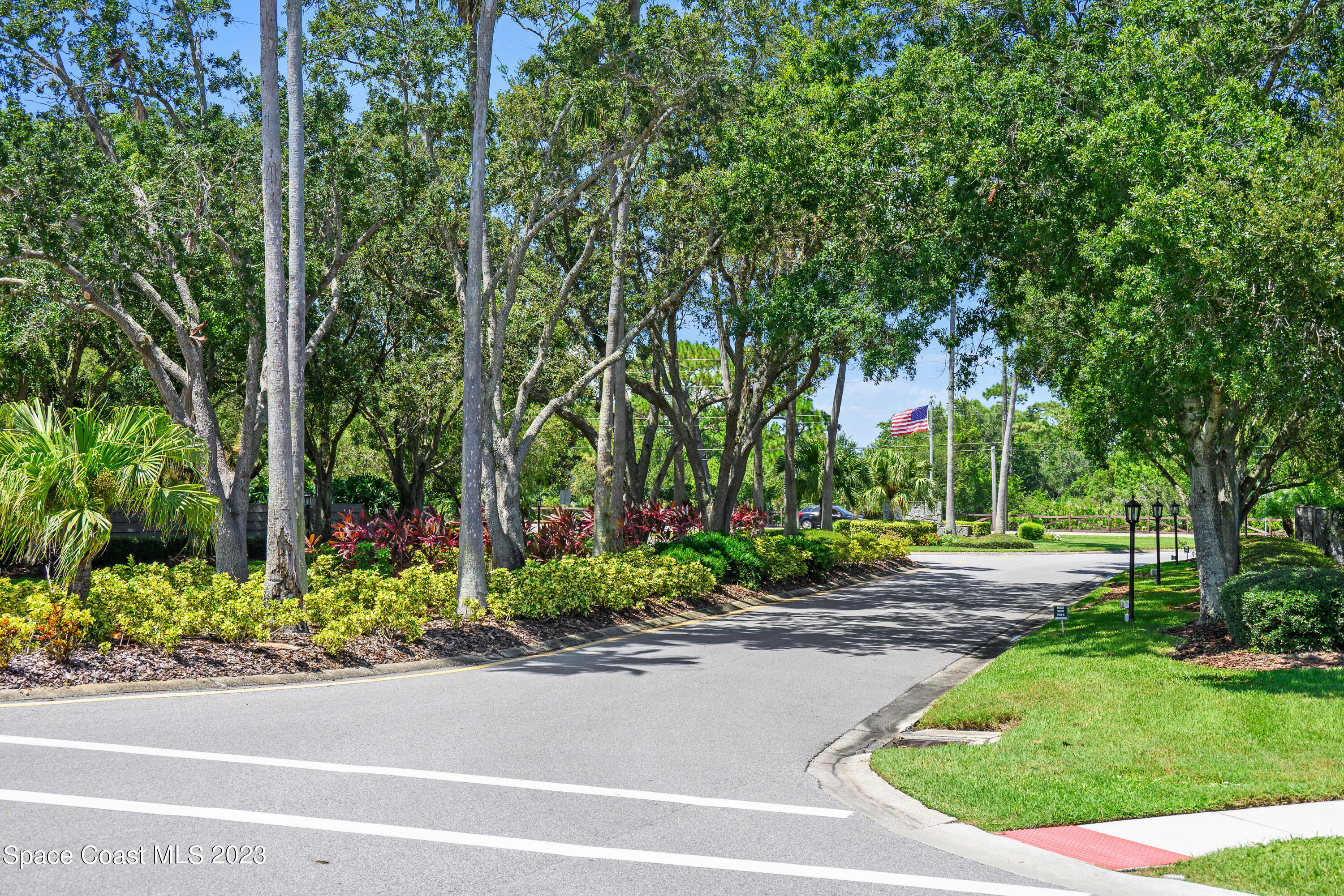 3360 Holly Springs Road Melbourne, FL 32934 - Photo 11 of 42 a garden view with a seating space