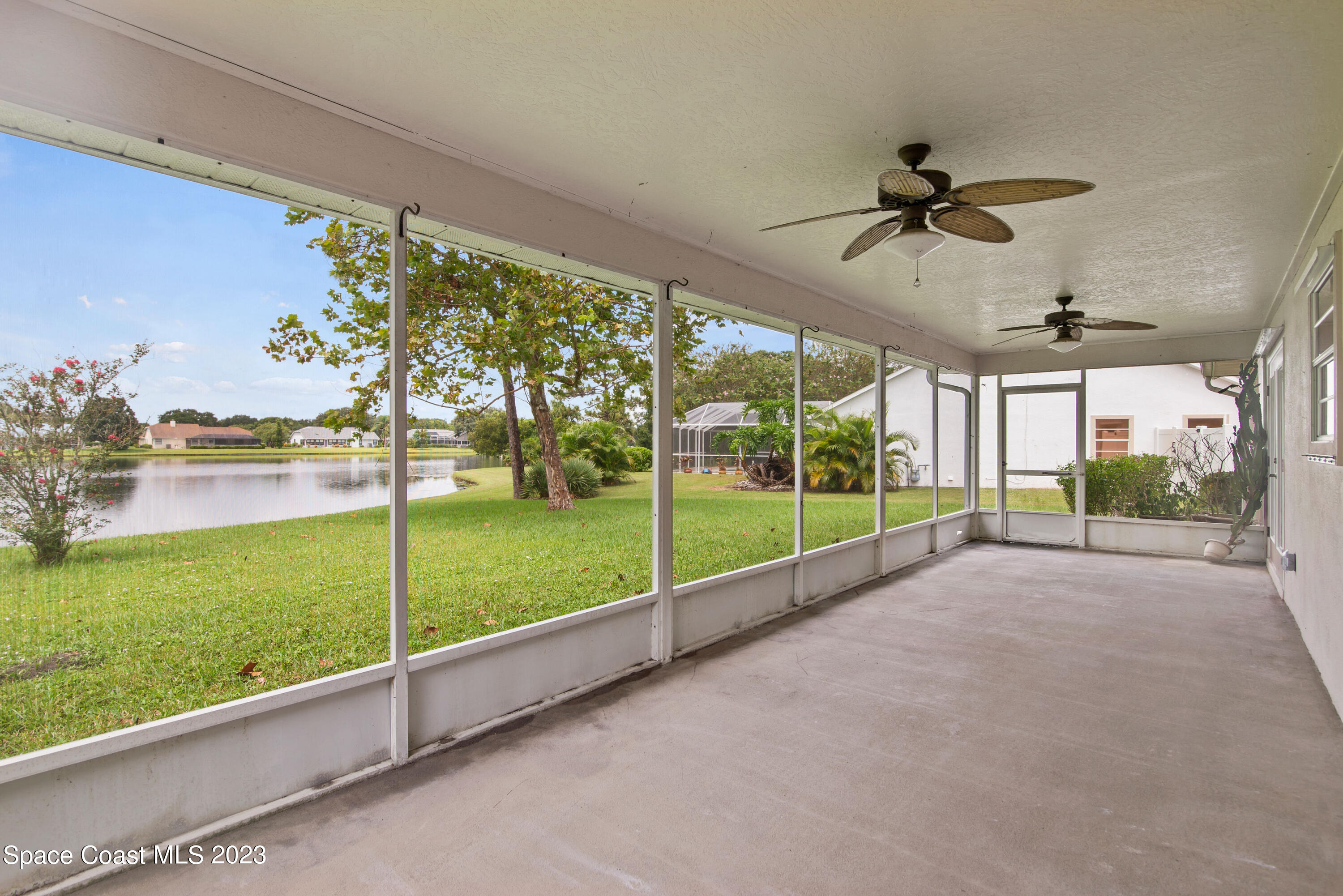 3360 Holly Springs Road Melbourne, FL 32934 - Photo 3 of 42 a view of a garden with an outdoor space