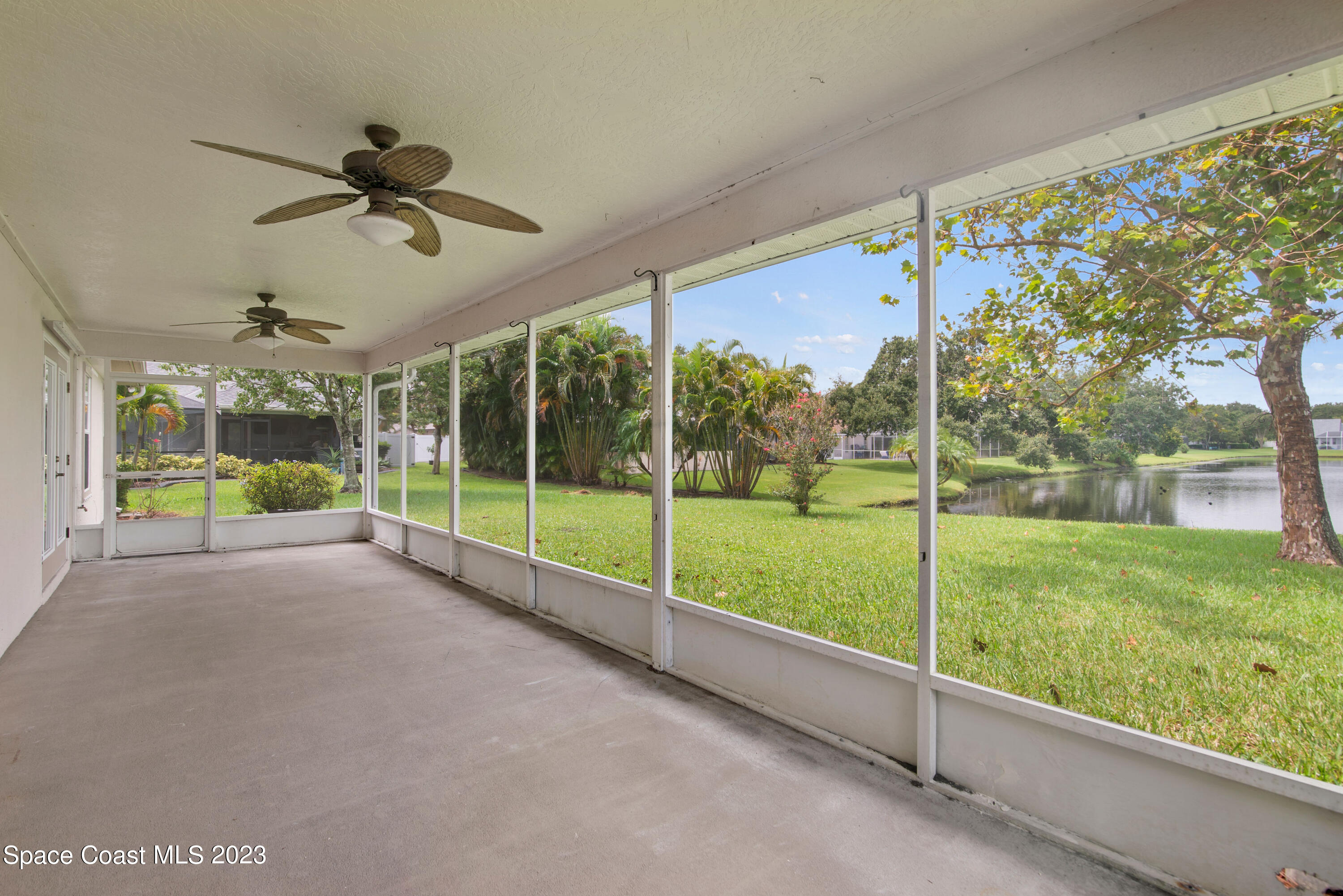 3360 Holly Springs Road Melbourne, FL 32934 - Photo 34 of 42 a view of a garden from a window