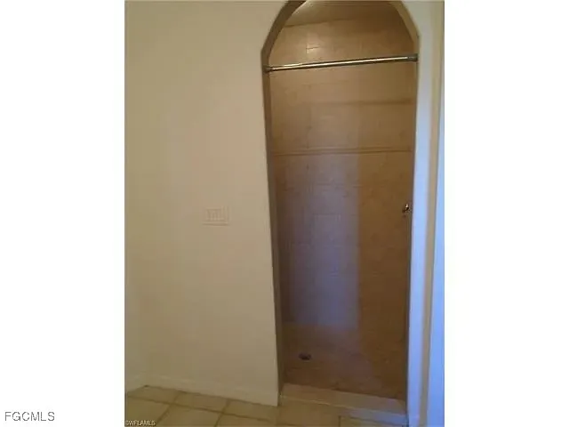 a bathroom with a glass door